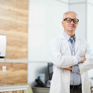 Confident Senior Doctor Looking at Camera